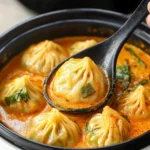 Soup Dumplings in Thai Red Curry Sauce